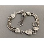 SILVER LADIES ORNATE BRACELET COMPLETE WITH TASSEL CHARM AND SWIVEL CATCH 24.2G