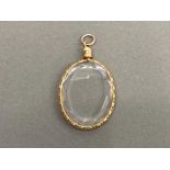 18CT YELLOW GOLD LOCKET PENDANT WITH ENGRAVED EDGING