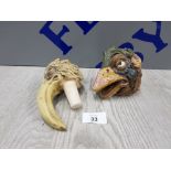 2 ANDREW HULL STUDIO POTTERY COPIES OF HEADS OF BIRDS PRODUCED BY THE MARTIN BROTHERS. 1 AS FOUND