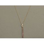 9CT YELLOW GOLD PENDANT SET EIGHT PINK SAPPHIRES AND 3 DIAMOND WITH 9CT YELLOW GOLD NECKLET 1.2G