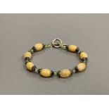 SILVER YELLOW AGATE AND GREEN BEAD BRACELET