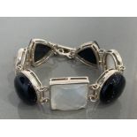 LADIES SILVER STONE SET BRACELET WITH BLACK AND WHITE STONES COMPLETE WITH T BAR 44.7G GROSS