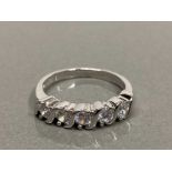 SILVER AND CZ 5 STONE 1/2 ETERNITY RING SIZE O 2.7G GROSS