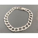 SILVER GENTS SQUARE LINK CURB BRACELET FEATURING HIGHLY POLISHED LINKS SET WITH PATTERNED LINK IN