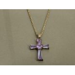 LADIES SILVER CROSS AND CHAIN FEATURING A PURPLE STONE SET CROSS COMPLETE WITH SILVER CHAIN 17.6G