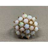 9CT YELLOW GOLD 19 STONE OPAL 3 ROW CLUSTER RING (TWO STONES CHIPPED) SIZE H 4.1G GROSS