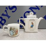 THE TALE OF PETER RABBIT BEATRIX POTTER TEAPOT TOGETHER WITH WEDGWOOD PETER RABBIT CUP