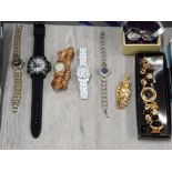 8 FASHIONABLE WRIST WATCHES WITH A COLLECTION OF COSTUME JEWELLERY INCLUDES EARINGS AND NECKLACES