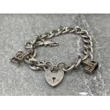 SILVER PATTERNED CURB STYLE ASSORTED CHARM BRACELET 29.7G