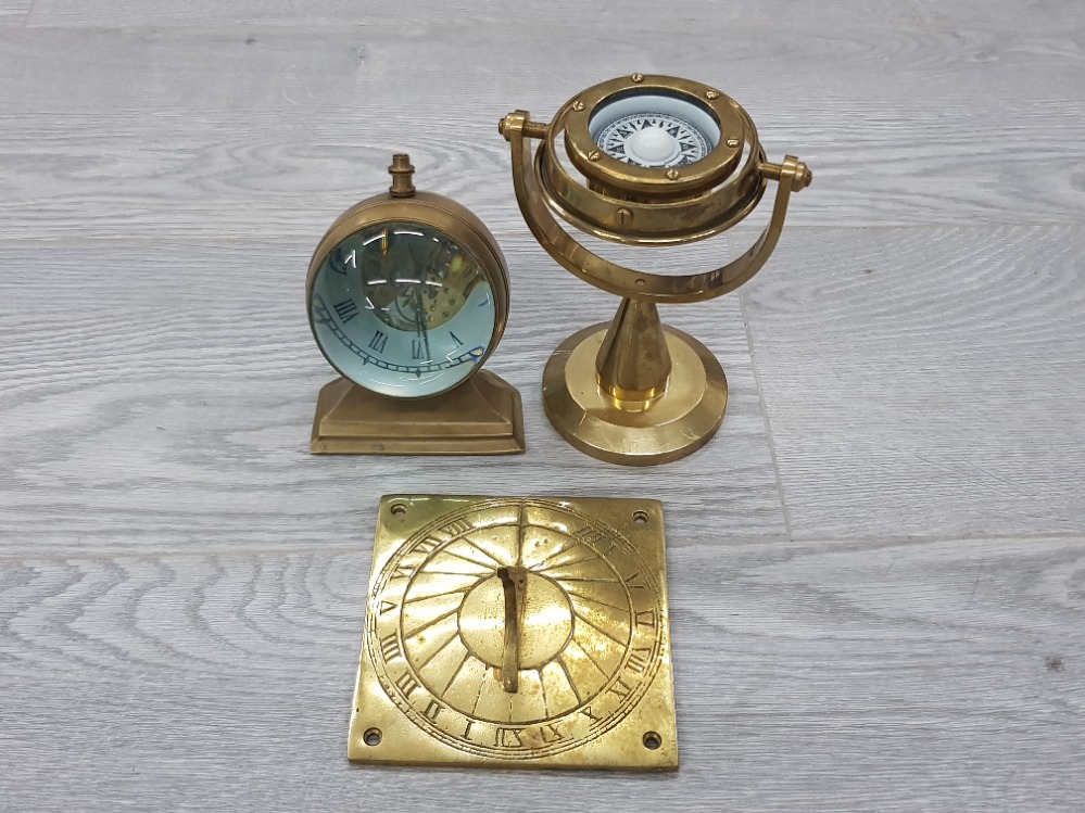 3 BRASS ITEMS INCLUDES A SWIVEL COMPASS CLOCK AND A SUNDIAL