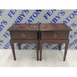 A PAIR OF STAG MINSTREL BEDSIDE TABLES