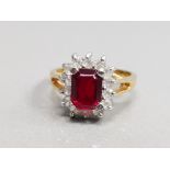 SILVER GOLD PLATED RED AND WHITE STONE CLUSTER RING COMPRISING OF SINGLE RED STONE SET IN A FOUR