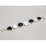 SILVER STONE SET BRACELET SET WITH BLACK AND WHITE STONE WITH T BAR CATCH 44.8G GROSS