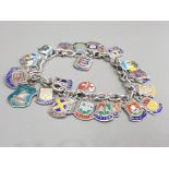 SILVER BRACELET WITH ASSORTED SILVER SHIELD CHARMS 46.1G GROSS