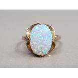 9CT YELLOW GOLD LADIES OPAL RING COMPRISING OF A OVAL SHAPED OPAL IN A CLAW SETTING SIZE O 3.2G