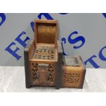 AN ART DECO MUSICAL CIGARETTE BOX WITH CARVED FIGURE OF AN OWL TO THE FRONT