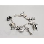 SILVER CHARM BRACELET WITH ASSORTED CHARMS 23.5G
