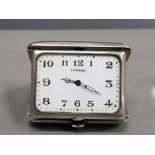 SILVER LONGINES RECTANGULAR CLOCK WITH BLACK NUMBERS AND HANDS