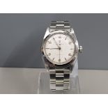 ROLEX GENTS STAINLESS STEEL 1953 OYSTER PERPETUAL PRECISION WHITE DIAL NUMBER AND BATON HOUR MARKERS