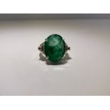 EMERALD RING IN 925 SILVER SURROUNDED WITH SMALL DIAMONDS SIZE M 1/2 WEIGHING 6.8G GROSS