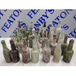 OLD VINTAGE GLASS BOTTLES FROM A DIG INCLUDES G. THOMPSONS AND SON FALKIRK LTD NEWCASTLE AND