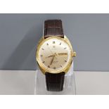 GENTS GOLD PLATED OMEGA SEAMASTER COSMIC AUTOMATIC DAY DATE CHAMPAGNE DIAL WITH BROWN LEATHER STRAP