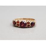 9CT YELLOW GOLD ORNATE GARNET SET RING ALL THE STONES ARE CLAW SET SIZE P1/2 3.2G GROSS