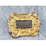 YELLOW METAL MEMENTO MORI BROOCH WITH TIGHT WOVE HAIR BEHIND CENTRAL CUT CRYSTAL 2.7 GRAMS GROSS