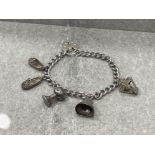 SILVER CHARM BRACELET WITH 5 CHARMS AND PADLOCK 23.4G