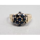 9CT YELLOW GOLD SAPPHIRE FLOWER CLUSTER RING SET IN A CLAW SETTING SET IN A BARK EFFECT SIZE M 2.