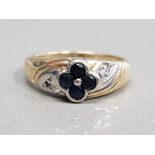 9CT YELLOW GOLD SAPPHIRE FLOWER RING COMPRISING OF FOUR ROUND CUT SAPPHIRES SET WITH A SINGLE