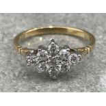 9CT GOLD DIAMOND CLUSTER RING COMPRISING OF NINE ROUND BRILLIANT CUT DIAMONDS APPROX .50CT 1.7G SIZE