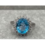LADIES 9CT WHITE GOLD BLUE TOPAZ AND DIAMOND CLUSTER RING 5.2G SIZE Q1/2