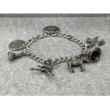 SILVER CURB BRACELET WITH 7 CHARMS 30.5G