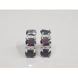 A PAIR OF GARNET DROP EARRINGS ON SILVER POSTS