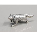 A SILVER FIGURE OF A DOG