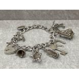SILVER BRACELET WITH 9 CHARMS 33.7G