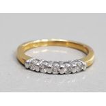 18CT YELLOW GOLD 5 STONE DIAMOND RING FEATURING 5 BRILLIANT ROUND CUT DIAMONDS SET IN A RUB OVER