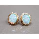 9CT YELLOW GOLD OPAL STUDS SET IN A RUB OVER SETTING 3.5G GROSS