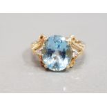 9CT YELLOW GOLD BLUE STONE RING COMPRISING OF A BLUE STONE SET IN THE CENTRE WITH A DIAMOND SET