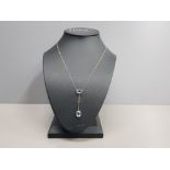 9CT YELLOW GOLD CHAIN WITH BLUE TOPAZ PENDANT WITH TWO SMALL DIAMONDS