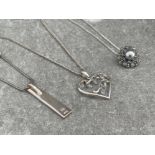 3 ASSORTED SILVER PENDANTS AND CHAINS