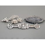 3 HALLMARKED SILVER BROOCHES 1 OVAL WITH FLOWER DESIGN 1 FLOWER AND LEAF DESIGN PLUS 1 SHIP BROOCH