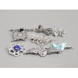8 ASSORTED SILVER BROOCHES 34.3G GROSS