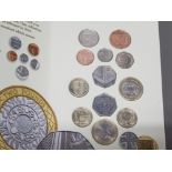 12 UK ROYAL MINT 2010 COINS, UNCIRCULATED YEAR SET, PACKET OPEN AT TOP