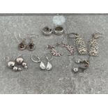 7 PAIRS OF SILVER EARRINGS 27.5G