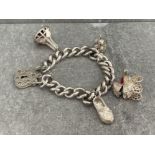 SILVER HEAVY ASSORTED CHARM BRACELET WITH PATTERNED PADLOCK 85G