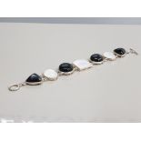 SILVER WHITE AND BLACK STONE BRACELET 44.9G GROSS