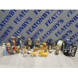 COLLECTION OF VARIOUS FIGURES INCLUDING LADY CANDLESTICKS, BUDDHAS AND A METAL MUSIC STAND ETC