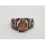 SILVER RING SET WITH ORANGE STONE POSSIBLY GARNET SIZE P 3.6G GROSS